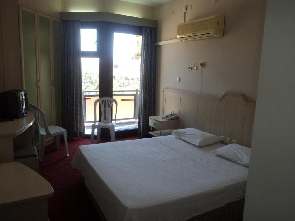 Двухместный (Стандартный двухместный номер с 1 кроватью или 2 отдельными кроватями) отеля Rıdvan, Чешме