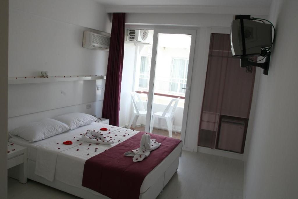 Двухместный (Стандартный двухместный номер с 1 кроватью или 2 отдельными кроватями) отеля Scala Nuova Annex, Чешме