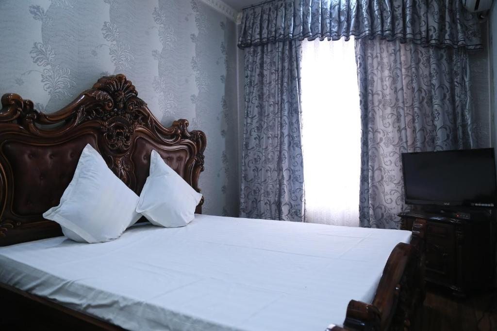 Двухместный (Двухместный номер Делюкс с 1 кроватью и ванной) отеля Nurafshon, Бухара