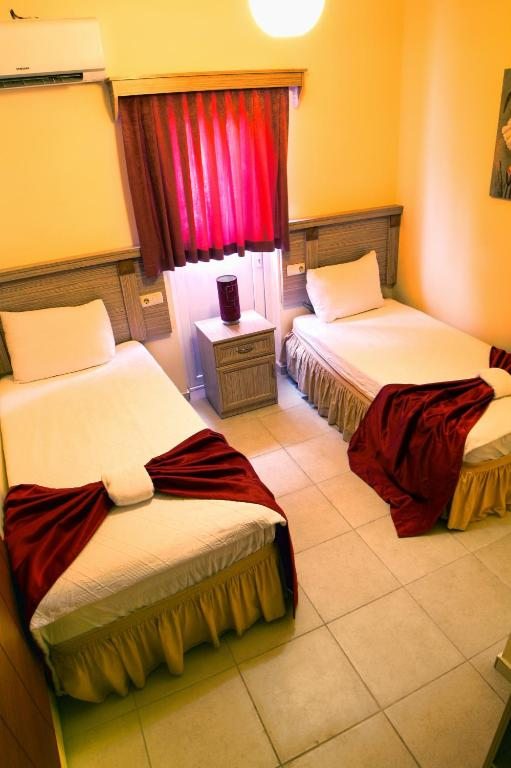 Двухместный (Двухместный номер с 2 отдельными кроватями) отеля Sevin Hotel Pension, Бодрум