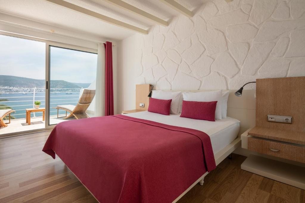 Двухместный (Стандартный двухместный номер с 1 кроватью или 2 отдельными кроватями, вид на море) курортного отеля Voyage Bodrum Hotel - Adult Only +16, Бодрум