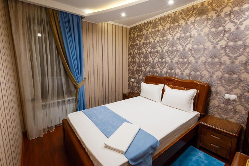 Сьюит (Номер-студия Делюкс с кроватью размера «king-size») отеля Salut Hotel Almaty, Алматы