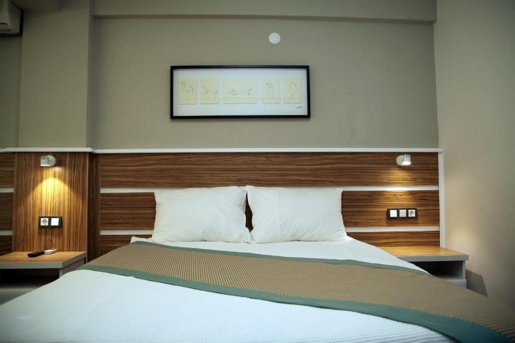 Двухместный (Улучшенный двухместный номер с 1 кроватью или 2 отдельными кроватями и видом на сад) отеля Pirlanta Butik Otel, Чешме