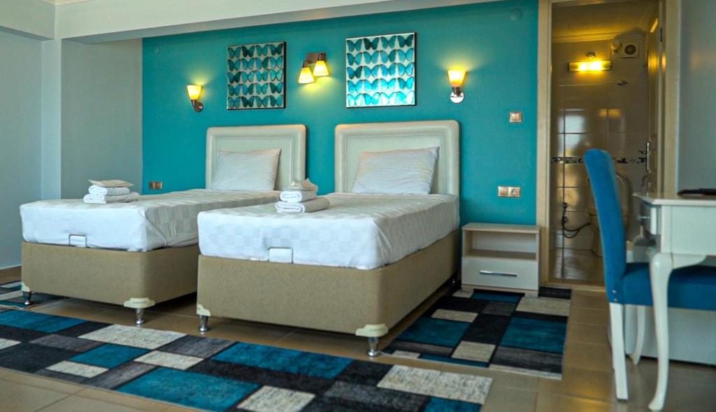 Двухместный (Стандартный двухместный номер с 2 отдельными кроватями и видом на море) отеля Fener Hotel Café & Kahvalti, Чешме