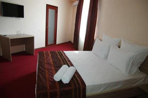 Двухместный (Улучшенный номер с 1 кроватью) отеля KZO, Шымкент
