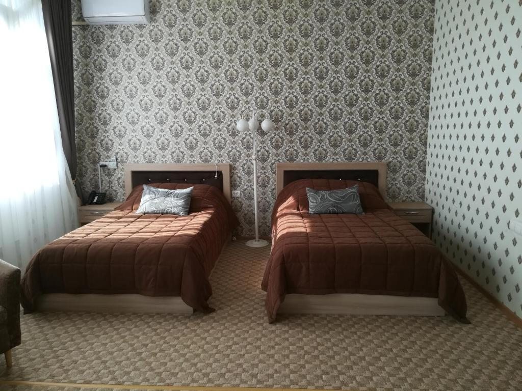 Двухместный (Просторный двухместный номер с 2 отдельными кроватями) отеля Bahetle, Экибастуз