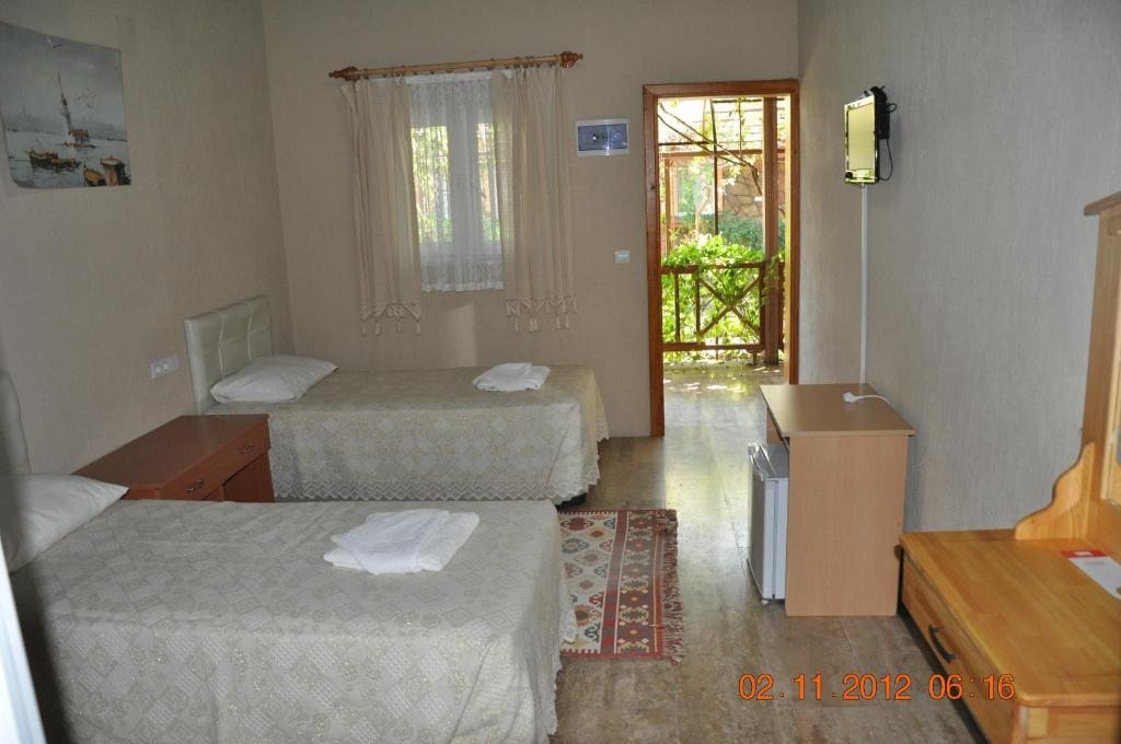 Двухместный (Стандартный двухместный номер с 2 отдельными кроватями) гостевого дома Bahaus Resort, Дальян