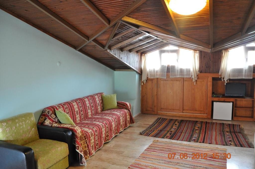Двухместный (Улучшенный двухместный номер с 1 кроватью и диваном) гостевого дома Bahaus Resort, Дальян