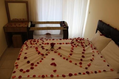 Двухместный (Улучшенный номер с 1 двуспальной кроватью (160х200см) и софой) отеля Four Seasons Apart Hotel, Дальян