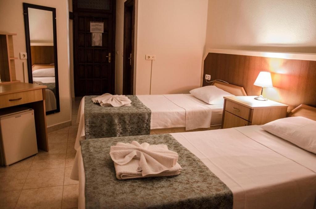 Двухместный (Стандартный двухместный номер с 2 отдельными кроватями) отеля Yaprak Hotel, Дальян