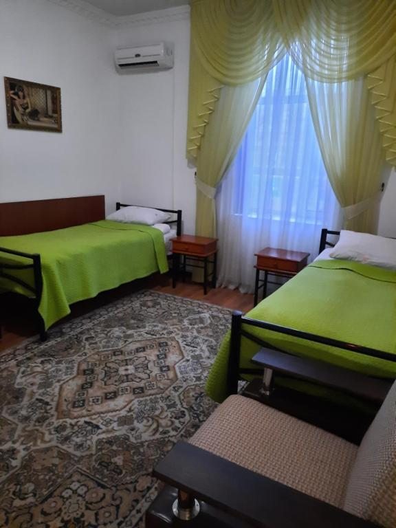 Двухместный (Двухместный номер с 2 отдельными кроватями и собственной ванной комнатой) отеля Уют, Шымкент