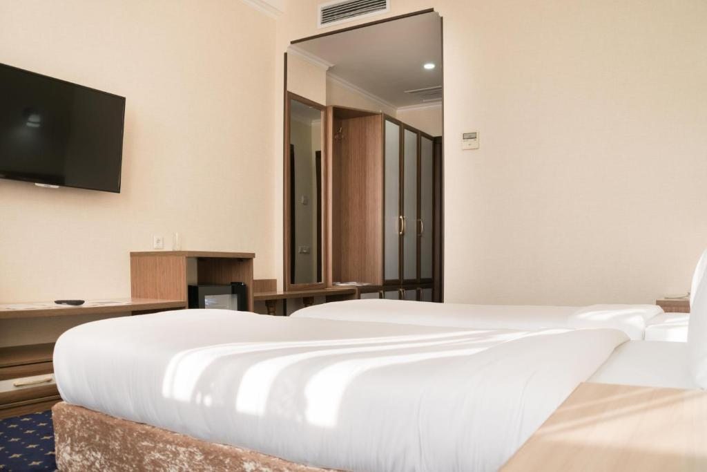 Двухместный (Двухместный номер с 2 отдельными кроватями - Подходит для гостей с ограниченными физическими возможностями) отеля Ханака, Туркестан