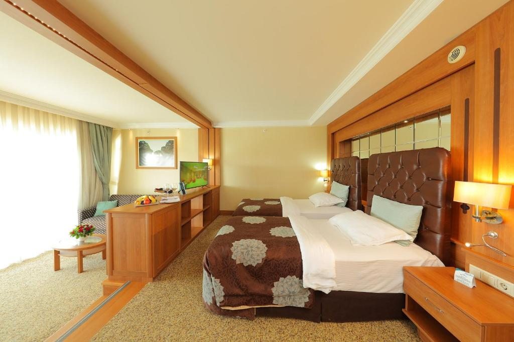 Трехместный (Улучшенный трехместный номер) курортного отеля Sueno Hotels Golf Belek, Белек