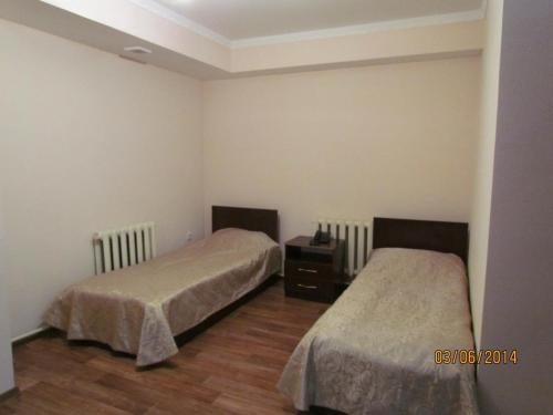 Двухместный (Двухместный номер эконом-класса с 2 отдельными кроватями) гостиницы Баракат, Астана