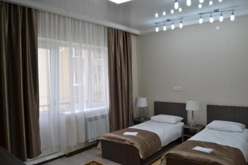 Номер (Односпальная кровать в общем номере для мужчин и женщин) отеля ARMAN, Актау