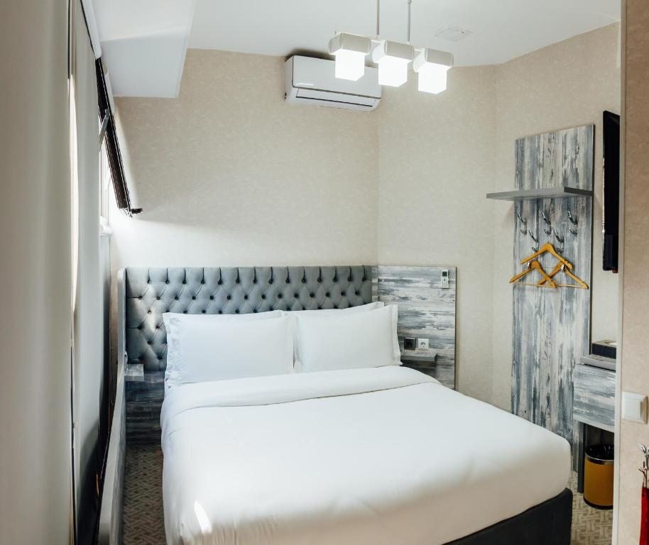 Двухместный (Двухместный номер Делюкс с 1 кроватью) отеля Express city hotel, Шымкент