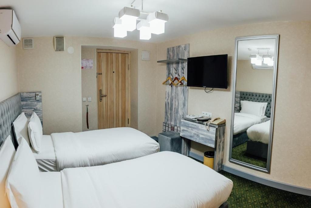 Двухместный (Стандартный двухместный номер с 2 отдельными кроватями) отеля Express city hotel, Шымкент