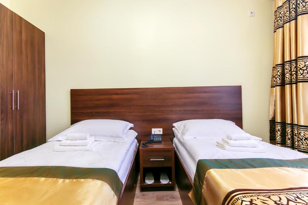 Двухместный (Двухместный номер с 2 отдельными кроватями и душем) отеля Каусар, Астана