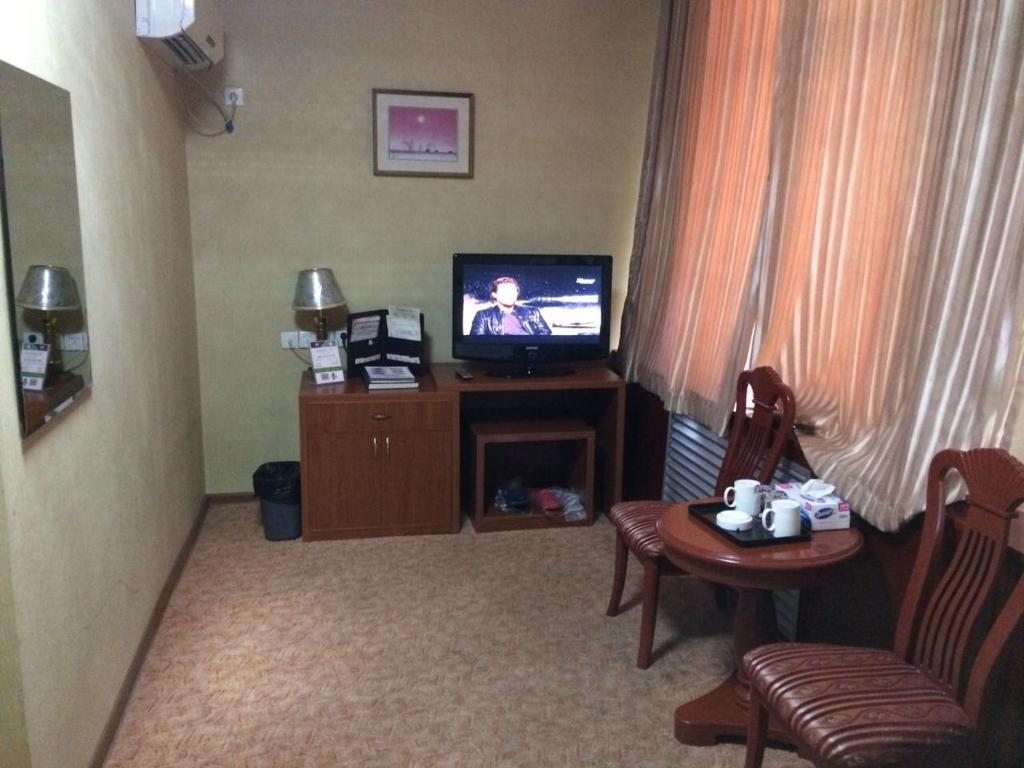 Двухместный (Двухместный номер Делюкс с 1 кроватью) отеля Золотой Дракон, Алматы