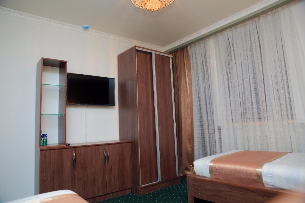 Двухместный (Двухместный номер с 2 отдельными кроватями) отеля Aska, Нарын