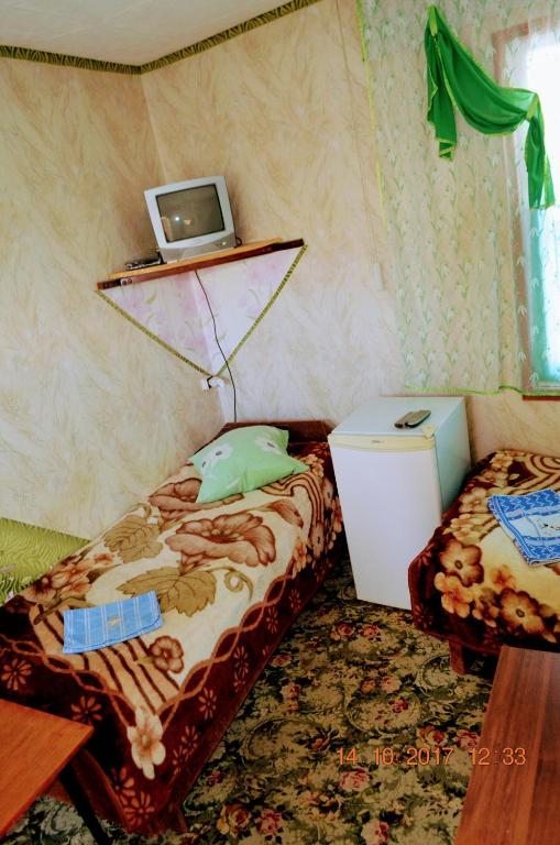 Двухместный (Двухместный номер с 2 отдельными кроватями, вид на сад) отеля Петровская Пристань, Чолпон-Ата