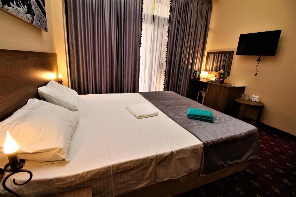 Двухместный (Улучшенный двухместный номер Делюкс с 1 кроватью или 2 отдельными кроватями) отеля Чкалов, Адлер