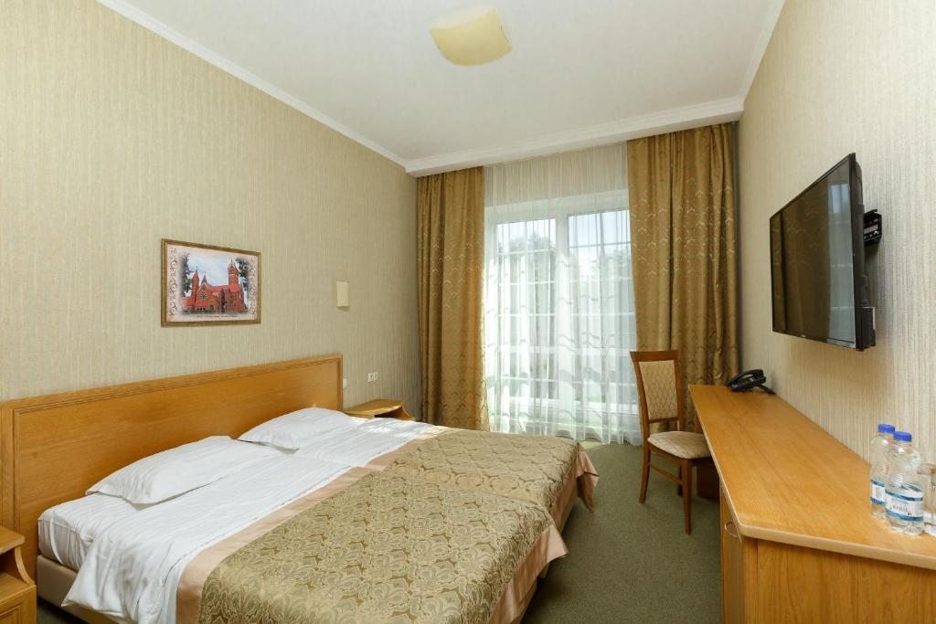 Двухместный (Двухместный номер с 2 отдельными кроватями и балконом, вид на озеро) отеля Плисса, Плиса