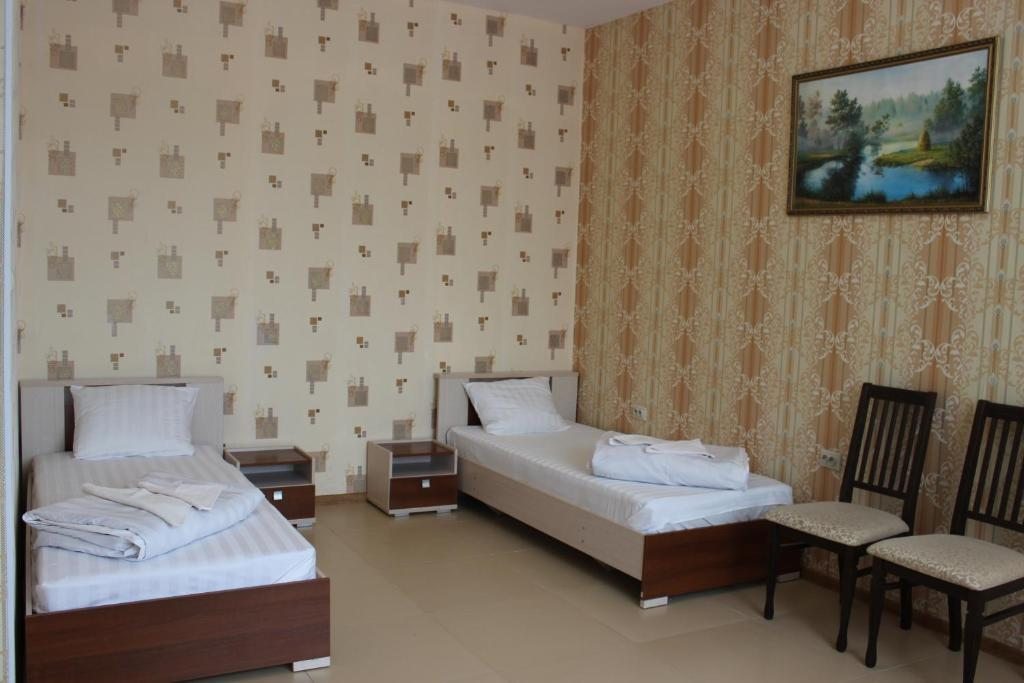 Двухместный (Просторный двухместный номер с 2 отдельными кроватями) отеля Ёшки-Матрешки, Прибор