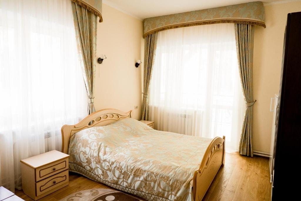 Двухместный (Стандартный двухместный номер с 1 кроватью) отеля Беловежская Пуща Жарковщина