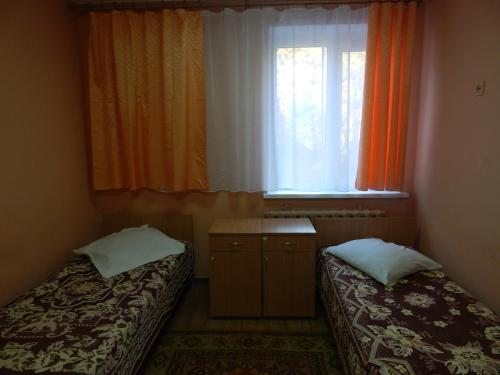 Двухместный (Бюджетный двухместный номер с 2 отдельными кроватями) отеля Купалинка, Гродно