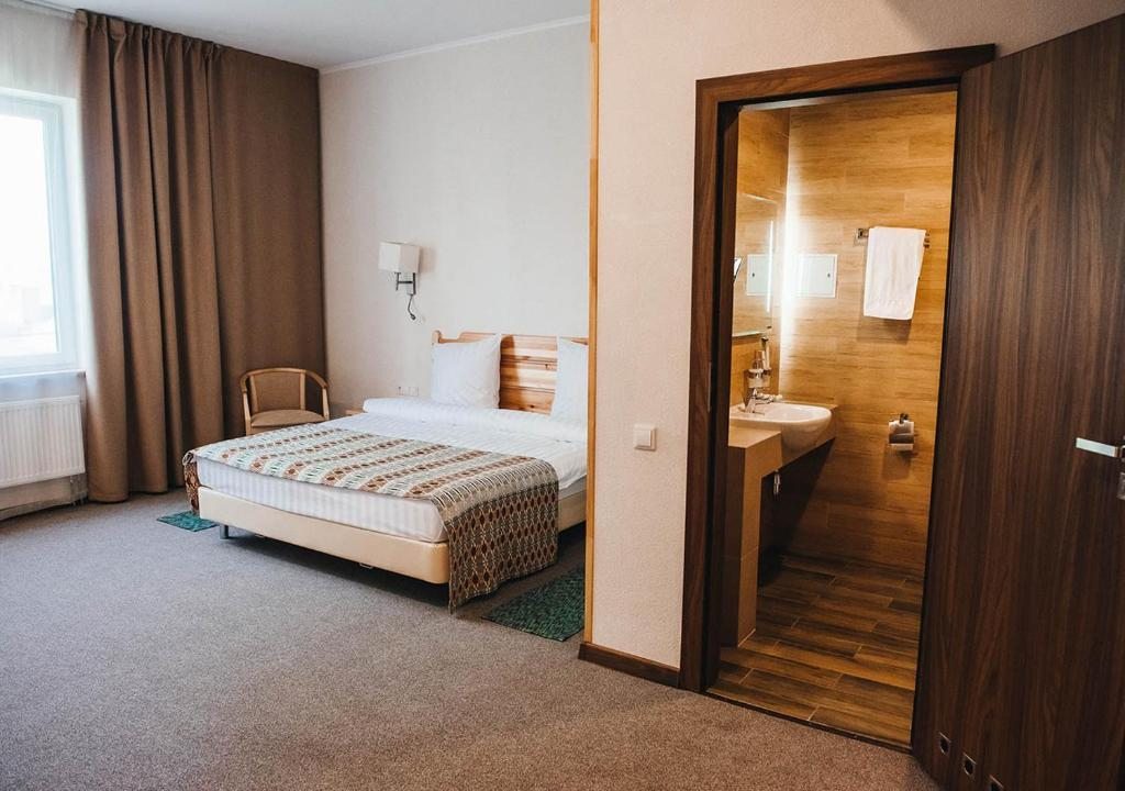 Семейный (Семейный двухместный номер с 1 кроватью) отеля Green Park Airport Minsk, Смольница