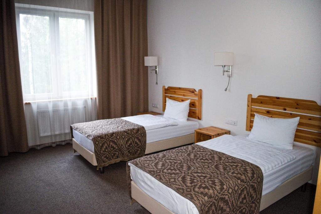 Двухместный (Двухместный номер «Премиум» с 2 отдельными кроватями - Подходит для гостей с ограниченными физическими возможностями) отеля Green Park Airport Minsk, Смольница