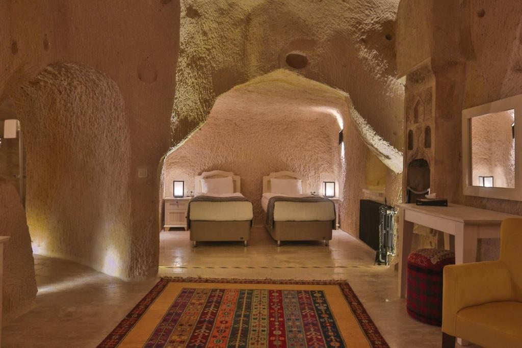 Трехместный (Трехместный номер Делюкс) отеля Acropolis Cave Suite, Ургюп