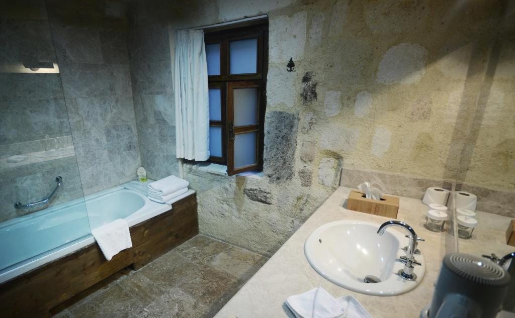 Двухместный (Стандартный двухместный номер с 1 кроватью или 2 отдельными кроватями) отеля Fresco Cave Suites Cappadocia, Ургюп