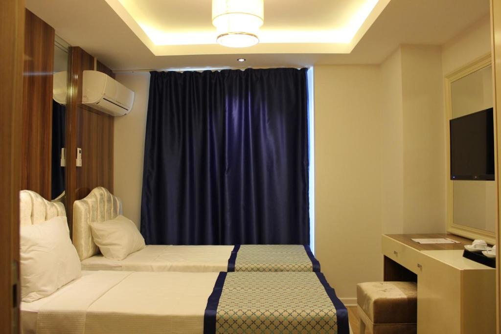 Двухместный (Бюджетный двухместный номер с 1 кроватью или 2 отдельными кроватями) отеля Safran City Hotel, Сафранболу