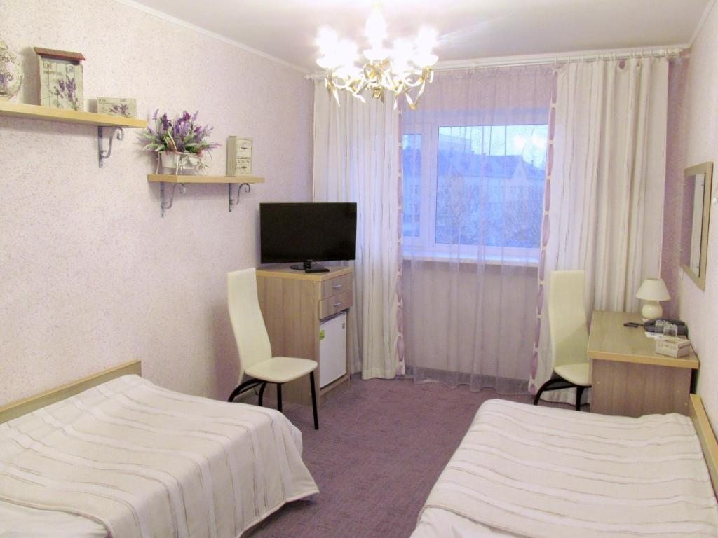 Двухместный (Двухместный номер «Комфорт» с 2 отдельными кроватями) отеля Ветразь, Витебск