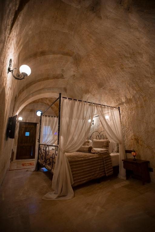Двухместный (Улучшенный двухместный номер с 1 кроватью) отеля Asuwari Suites Cappadocia, Ургюп