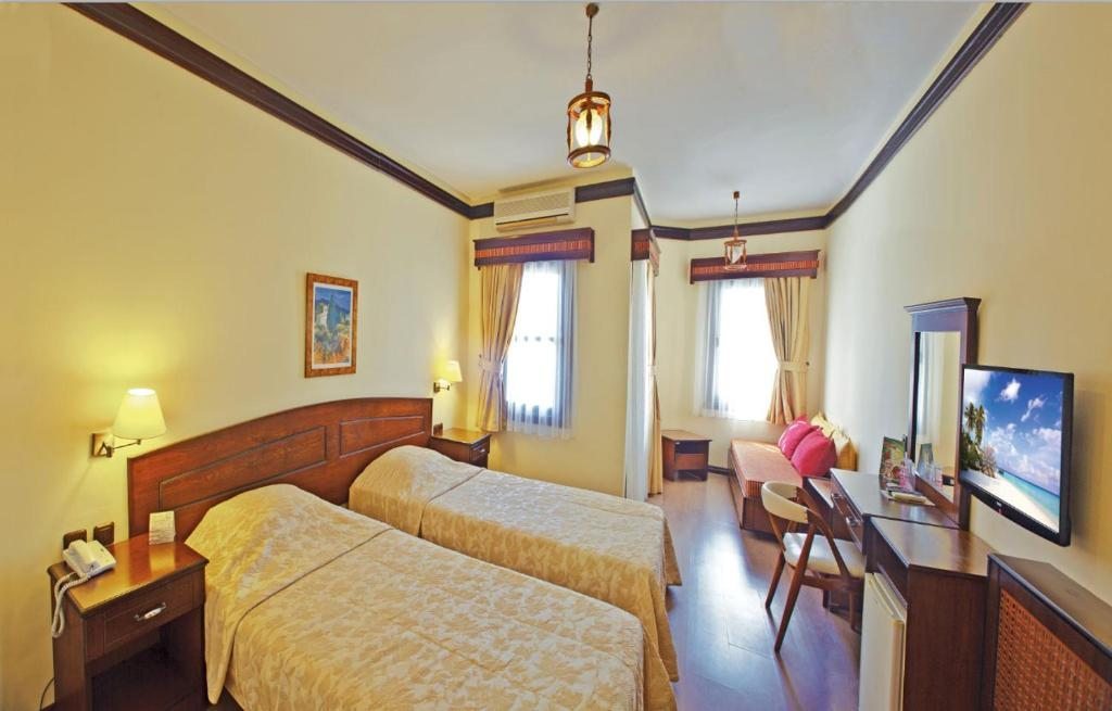 Двухместный (Двухместный номер с 1 кроватью или 2 отдельными кроватями и дополнительной кроватью) отеля Yucelen, Акьяка