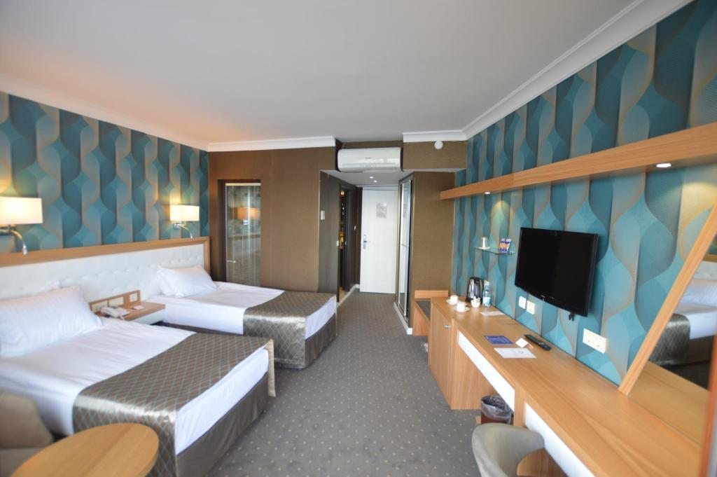 Двухместный (Двухместный номер Делюкс с 1 кроватью или 2 отдельными кроватями и видом на море) отеля Akol Hotel, Чанаккале