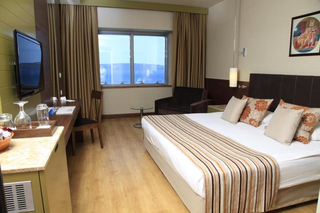 Двухместный (Двухместный номер Делюкс с 1 кроватью или 2 отдельными кроватями и видом на море) отеля Kolin, Чанаккале