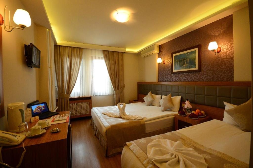 Трехместный (Улучшенный трехместный номер) отеля Anzac Hotel, Чанаккале