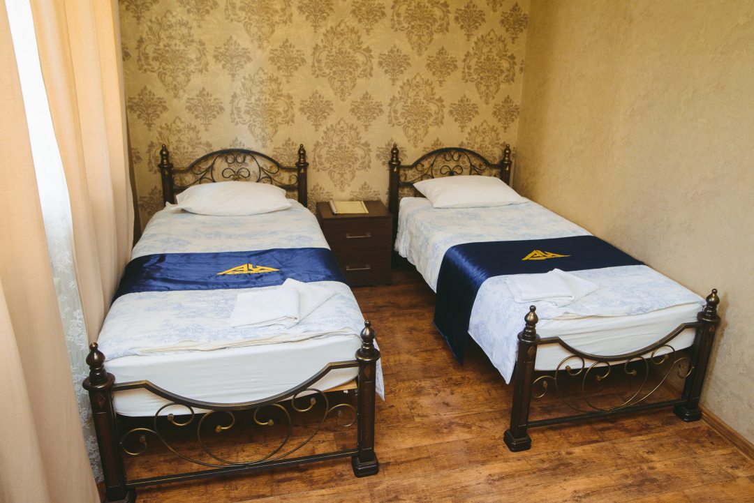 Двухместный (Стандарт с двумя односпальными кроватями) гостиницы Au Rooms Континент, Новокузнецк