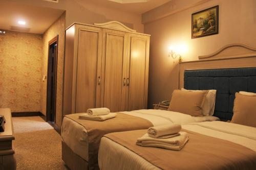 Двухместный (Двухместный номер Делюкс с 2 отдельными кроватями) отеля Vendome Hotel, Эскишехир