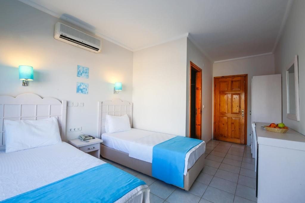 Двухместный (Двухместный номер с 1 кроватью или 2 отдельными кроватями и частичным видом на море) отеля Bora Hotel, Датча