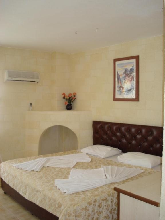 Двухместный (Двухместный номер с 1 кроватью или 2 отдельными кроватями) отеля Mithat Motel, Адрасан