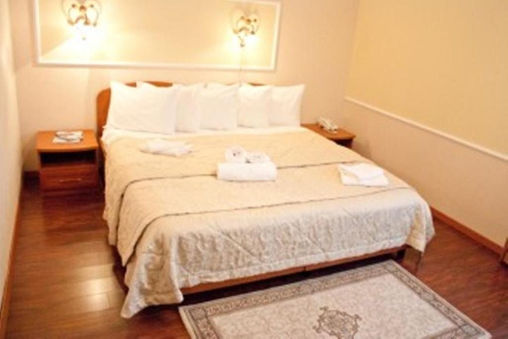 Двухместный (Улучшенный двухместный номер с 1 кроватью или 2 отдельными кроватями) отеля Европа, Ноябрьск