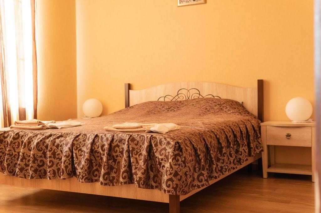 Двухместный (Двухместный номер с двуспальной кроватью и дополнительной кроватью) отеля Усадьба на Сушзаводской, Лотошино