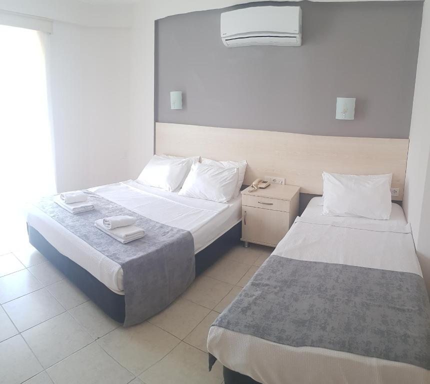 Двухместный (Двухместный номер с 1 кроватью или 2 отдельными кроватями) отеля Viras, Ортакент