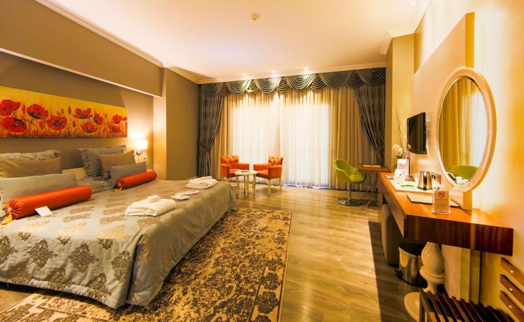 Двухместный (Двухместный номер Делюкс с 2 отдельными кроватями) отеля Doğa Thermal Health, Памуккале