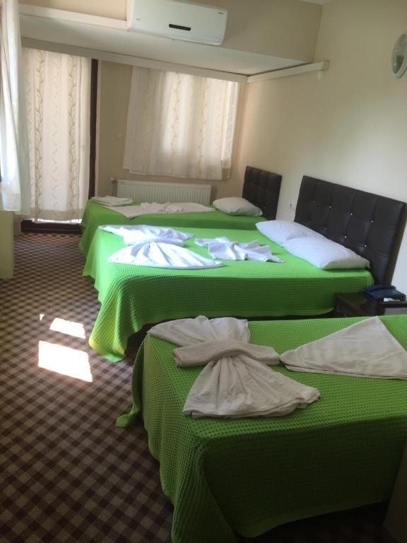 Четырехместный (Четырехместный номер) отеля Anatolia Hotel, Памуккале